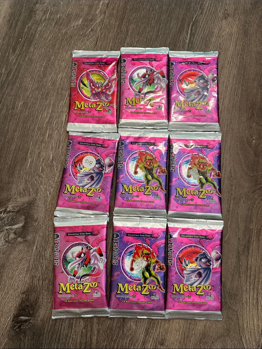 (9) MetaZoo Collectible Card Game Booster Packs - Pink/Magenta - Seance